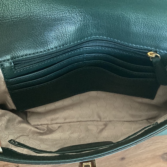MICHAEL KORS LEADER CLUTCH  BAG